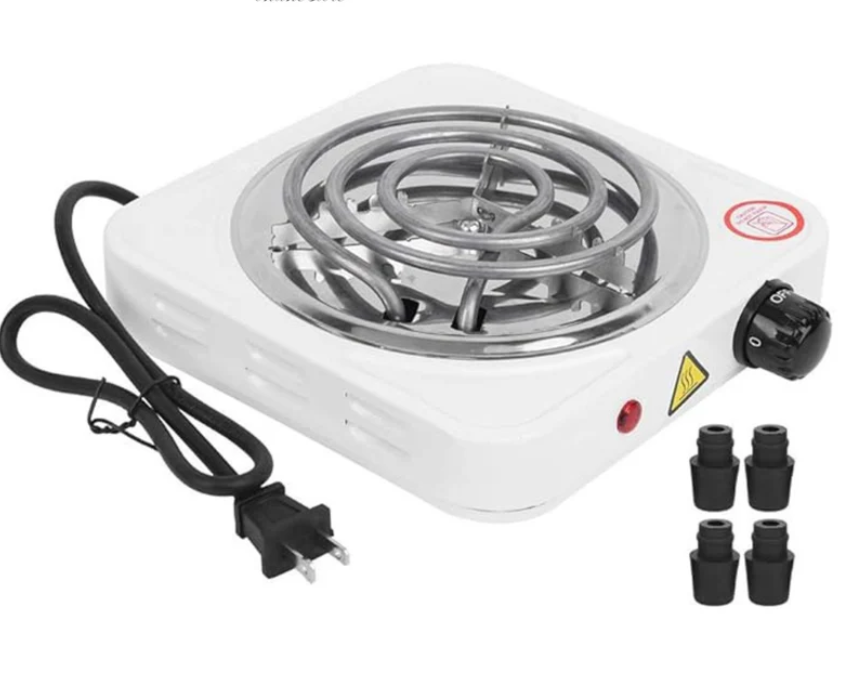 Portable electric stove with coil heating element on a white background