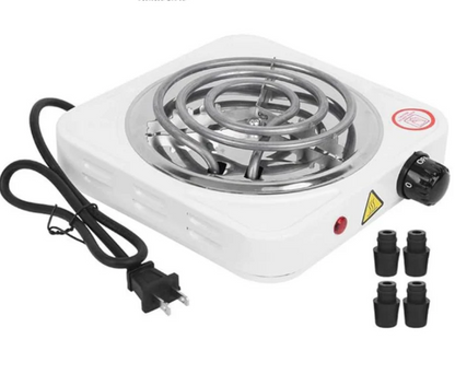 Portable electric stove with coil heating element on a white background