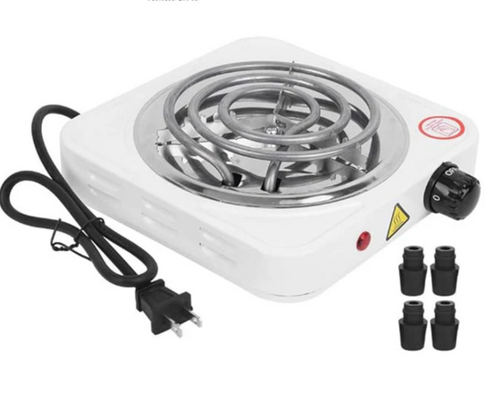Portable electric stove with coil heating element on a white background