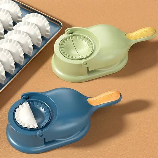 Two kitchen tools for making dough balls on a brown surface